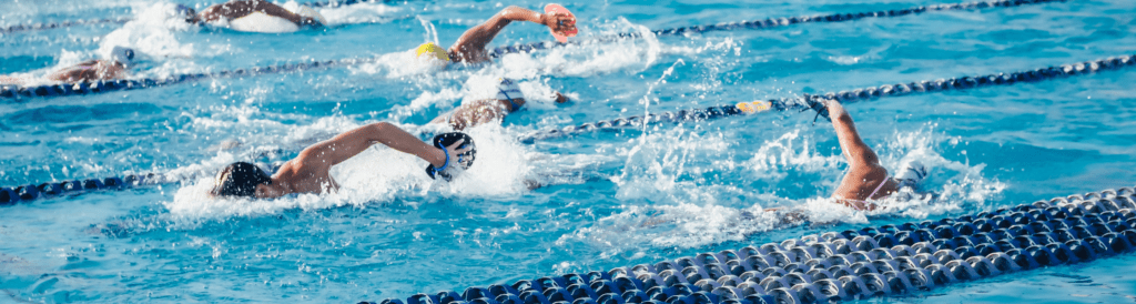 Swimmers in pool training, Giving Tuesday, Sport of Swimming